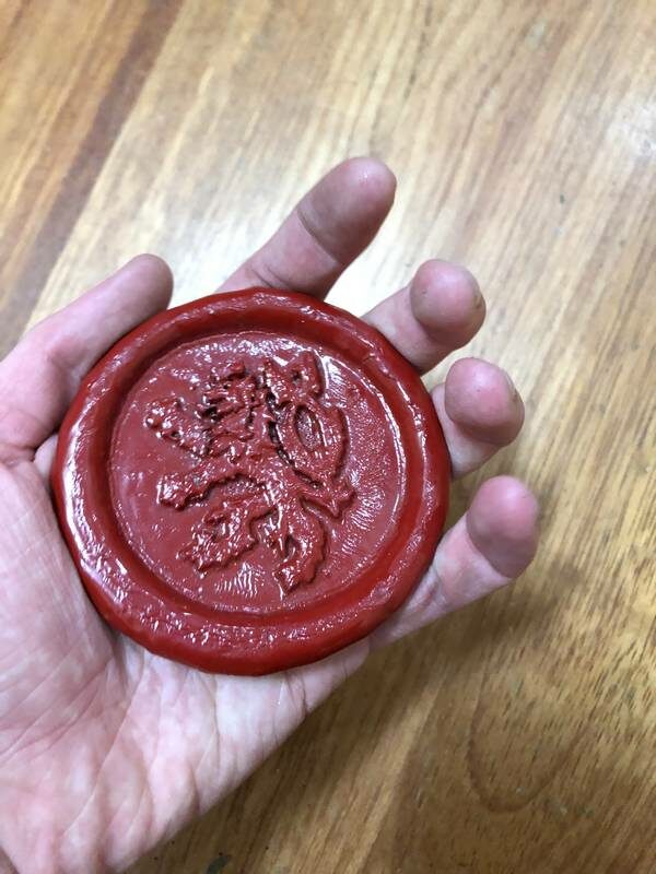 37th Seal in hand for scale